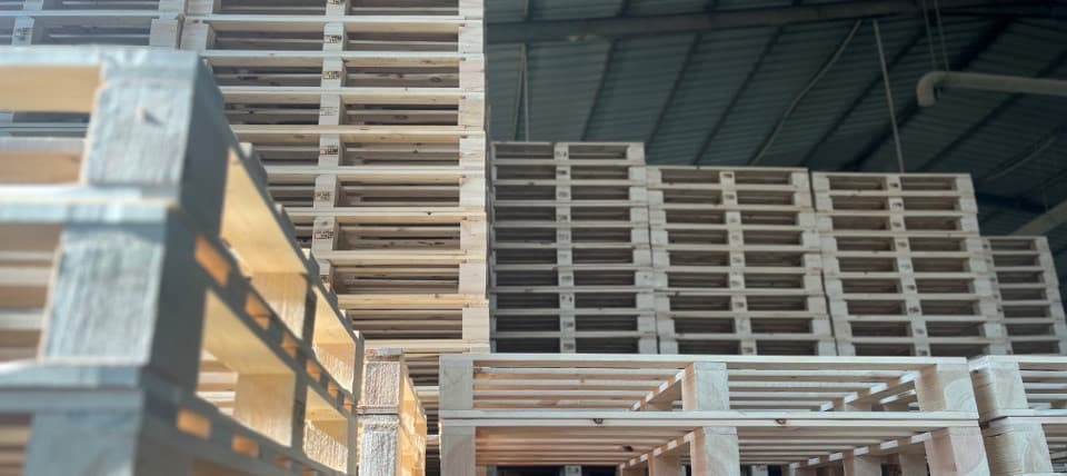 Pallets being sorted and remanufactured in the yard
